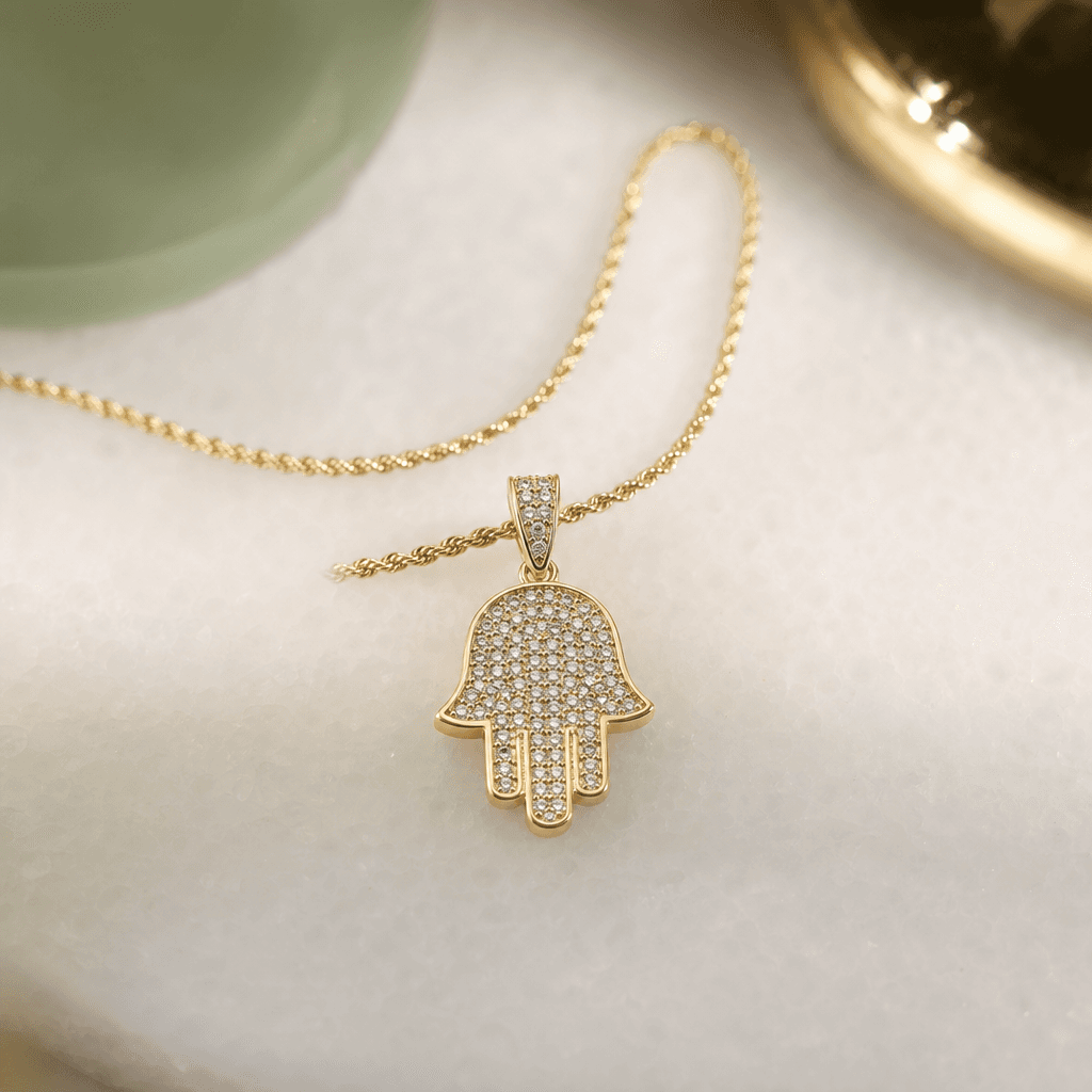 Solid 14K gold pavé hamsa pendant on a rope chain, Jade Gold NYC.
